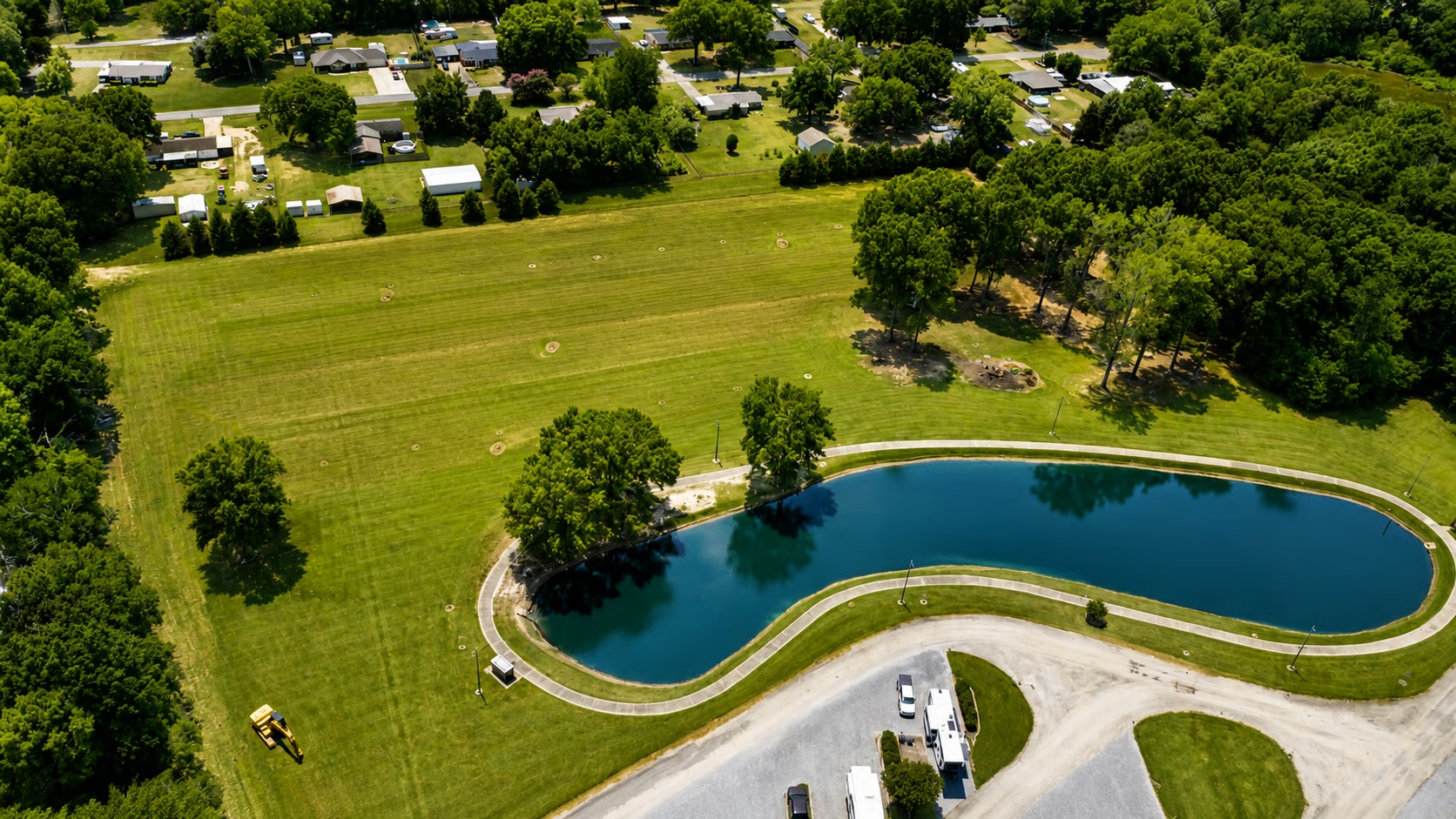 The pond and surrounding green space